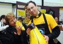 St Benedict's School -  Banana Eating World Record attempt. 
NO FATHER...THESE ARE THE REAL BANANAS:  Father Andrew from St Mary's Church, Cleator is a bit confused as to what banana to peel at the St Benedict's School's role in the