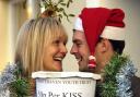 Jayne Laine kisses Liam Kavanagh under the mistletoe to raise money for Whitehaven Community Youth Trust