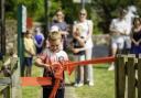 Cutting the ribbon at Beckermet play park