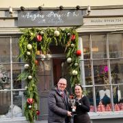 Charles Maudling, chairman of Whitehaven and District Chamber of Trade, presents the trophy to Angela Lewthwaite, of Angel's Perfect 10