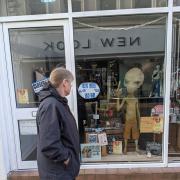The alien figure in the window of Haven Artisan on King Street, Whitehaven
