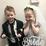 A mini bride and groom tied the knot during a mock ceremony organised by St Gregory & St Patrick's Catholic Infant School