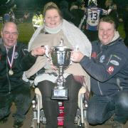 Comets’ management trio with the league title	Picture: Dave Payne
