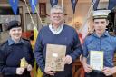 Edwin Dinsdale (centre) with members of the Sea Cadets