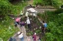 Volunteers planting in Bankfield Mansion Gardens in Workington