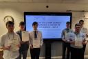 Students after receiving their engineering summer sprint project certificates at a specially-arranged project outbrief event held at Lakes College