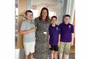Headteacher Sophie McCabe meets pupils Aiden Bell (from left), Joey Nawrockyj and Jack Watson for the first time