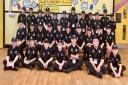The new cohort of Mini police officers at Bransty Primary School