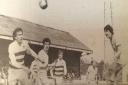 United's Tony Larkin, right, in aerial action at Reading as Paul Bannon, second left, looks on