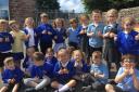 Children at Moresby Primary School celebrate the 'good' Ofsted report