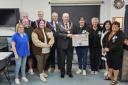 Members of Whitehaven Theatre of Youth and the donation from the fund
