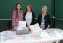 Three generations running the Loved by Lucas baby clothes and gifts stall. Grandmother Rene Chapman, daughter Julie Wilson and granddaughter Beth Wilson.