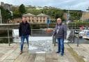 Deputy Mayor of Whitehaven Raymond Gill with Dean Hodgson of Canon. Replacing an outdoor photo exhibtion on Whitehaven Harbour