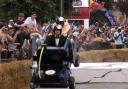 Kyle Rotheram and Rachael Elsley race around the Red Bull Soapbox Race route.