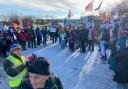 Protestors gather at the coal mine site in Whitehaven