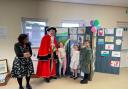 Some of the young artists meet Emma Hunt and town crier, Marc Goodwin