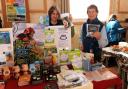 The Egremont Farmers Market has been celebrating Fairtrade since at least 2010 as this photo shows. Carol Woodman deputy co-ordinator for Fairtrade Cumbria network and Ruth Banks (right) from Egremont Fairtrade Steering Comm. with the Fairtrade stallyjat