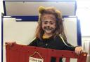 A pupil at Bransty Primary School dressed up as the lion from 'Dear Zoo'