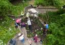 Volunteers planting in Bankfield Mansion Gardens in Workington