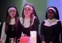 Amber performing in Sister Act