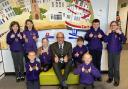 Pupils at Jericho Primary School celebrate with headteacher James Blackwell