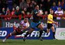 Leeds Rhinos' Konrad Hurrell (right) breaks away to score his sides first try if the game during the Betfred Super League match at Craven Park, Hull. PRESS ASSOCIATION Photo. Picture date: Thursday April 4, 2019. See PA story RUGBYL Hull KR. Photo