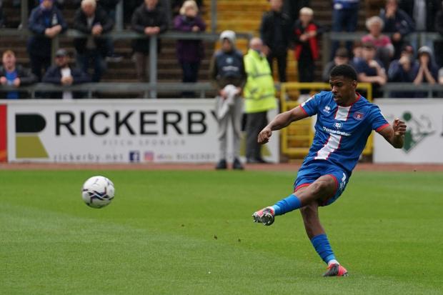 Tristan Abrahams nets from the spot against Leyton Orient (photo: Barbara Abbott)