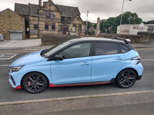 Whitehaven News: The Hyundai i20 N on test in the Low Moor area of Bradford, and pictured (top left) next to the flywheel on New Works Road once used in the Low Moor Steel Works