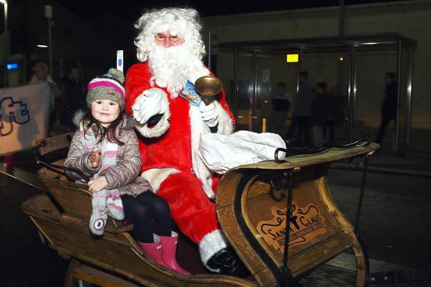 Whitehaven Christmas Lights Switch On.  pic MIKE McKENZIE 15th Nov 2015

Santa is joined by little Daisey Smith as they head around town on his sleigh to the Whitehaven Christmas lights switch on.  pic Mike McKenzie50081535W036.jpg