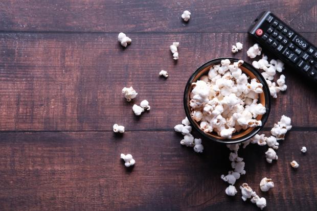 Whitehaven News: A bowl of popcorn and a TV remote (Canva)