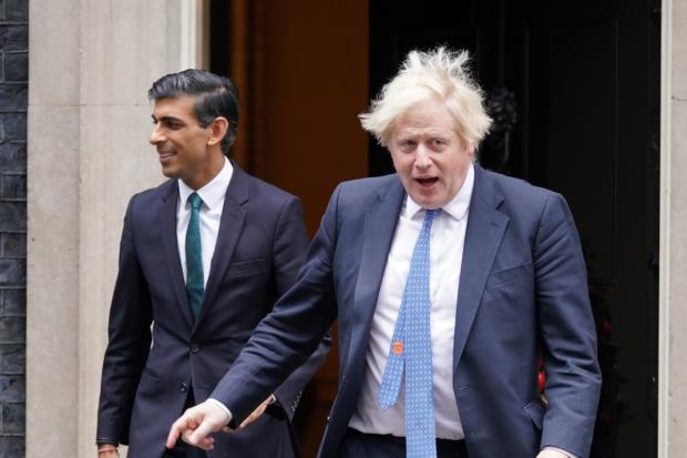 Rishi Sunak and Boris Johnson. Credit: PA