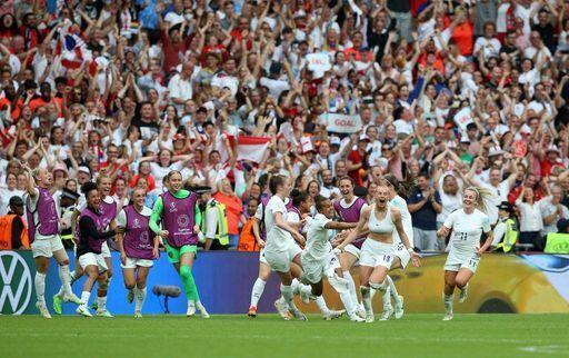 Whitehaven News: England and fans celebrate Kelly's goal