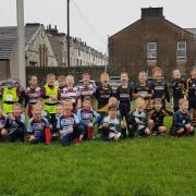 n Young players at Whitehaven Sharks under-sevens’ first rugby union festival of the season