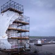 STORM: Some of the damage caused to the enviro wrap on the west pier lighthouse