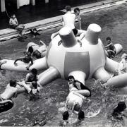 Children enjoy a huge inflatable that appeared in the Whitehaven Swimming Pool on  Duke Street