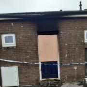 The fire damaged property at St James' Court in Whitehaven