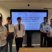 Students after receiving their engineering summer sprint project certificates at a specially-arranged project outbrief event held at Lakes College