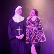 Hannah Birbeck (Left) performs alongside co-star Amber Hooper in Sister Act production