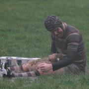 MUD BATH: Whitehaven flanker Lee Jones spurns the shower in favour of a post match bath on the pitch	             Peter Trainor