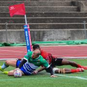 IN THE CORNER: Town’s Jonathan Walsh touches down against Skolars