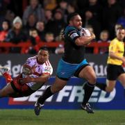 Leeds Rhinos' Konrad Hurrell (right) breaks away to score his sides first try if the game during the Betfred Super League match at Craven Park, Hull. PRESS ASSOCIATION Photo. Picture date: Thursday April 4, 2019. See PA story RUGBYL Hull KR. Photo