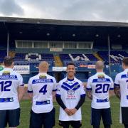 FRIDAY-NIGHT DATE: All roads lead to Headingley on the date displayed by the Workington Town players ahead of their trip to take on Leeds Rhinos