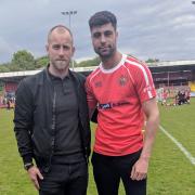 NEW BOSS: Danny Grainger with his first Reds signing, Nathan Waterston