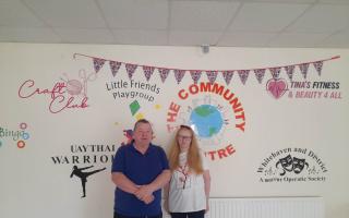 Allan Forster and Andrea Broatch a volunteer