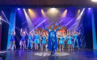 The genie with a troupe of dancers